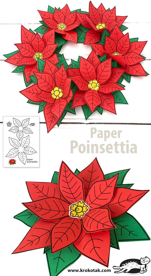 the paper poinsettia is cut out to look like flowers