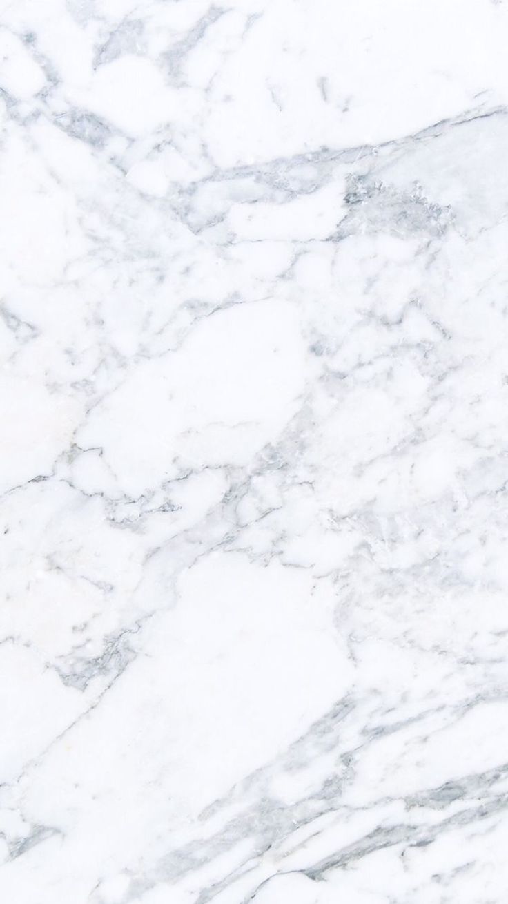 the michael kors logo is shown on a white marble surface with black and gray accents