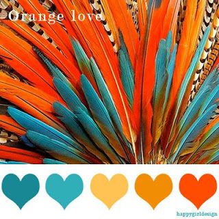 an orange, blue and green feather arrangement with hearts