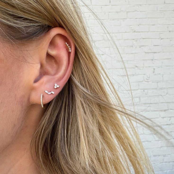 An everyday earring that can be layered on the ear or worn by itself! Single Rose Gold Ear Climber In 14k Gold, Silver 14k Gold Everyday Piercings, 14k White Gold Ear Climbers, Rose Gold Single Ear Climber In 14k Gold, Everyday Silver 14k Gold Piercings, Fine Jewelry Everyday Drop Cartilage Earrings, Tiny Yellow Gold Elegant Huggie Earrings, Tiny Elegant Yellow Gold Huggie Earrings, Fine Jewelry Cartilage Drop Earrings For Everyday