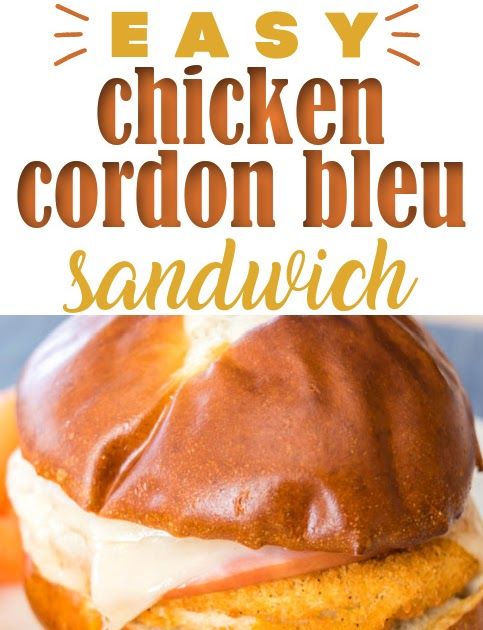 an easy chicken cordon bleu sandwich is shown on a plate with carrots