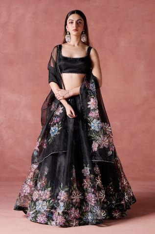 Black flared lehenga with Petunia garden print and zari-sequin embellishments detailing. Paired with a solid deep round neckline blouse with border embellishments and a printed embellished dupatta. - Aza Fashions Black Lehenga Party Wear, Organza Dupatta Embroidery, Hand Painted Lehenga, Petunia Garden, Shadi Outfits, Round Neckline Blouse, Bridesmaid Indian, Blouse With Border, Dupatta Embroidery