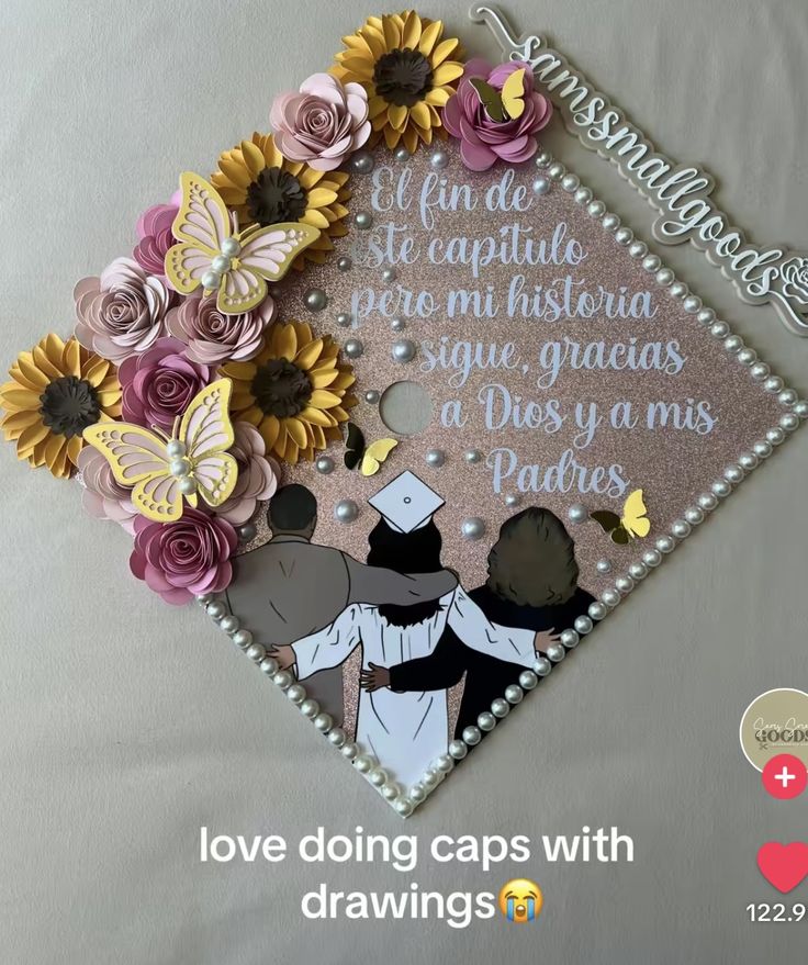 a graduation cap with some flowers and butterflies on it, next to the words i love doing caps with paper flowers