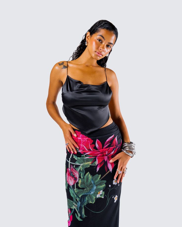 The only flower they get to see 🌺 You��’ll be growin’ on them in this gorgeous two-piece set featuring a sleek black triangle top and a floral print maxi skirt 🖤 Chic Floral Print Fitted Maxi Skirt, Chic Fitted Floral Maxi Skirt, Summer Black Maxi Skirt With Floral Print, Black Floral Print Maxi Skirt For Spring, Summer Evening Skirt With Floral Print, Summer Evening Floral Print Skirt, Black Floral Print Party Skirt, Summer Evening Floral Skirt, Floral Print Maxi Skirt For Parties