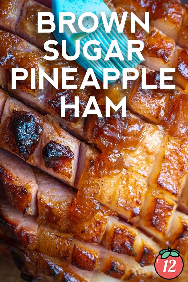 brown sugar pineapple ham on a platter with text overlay that reads, brown sugar pineapple ham