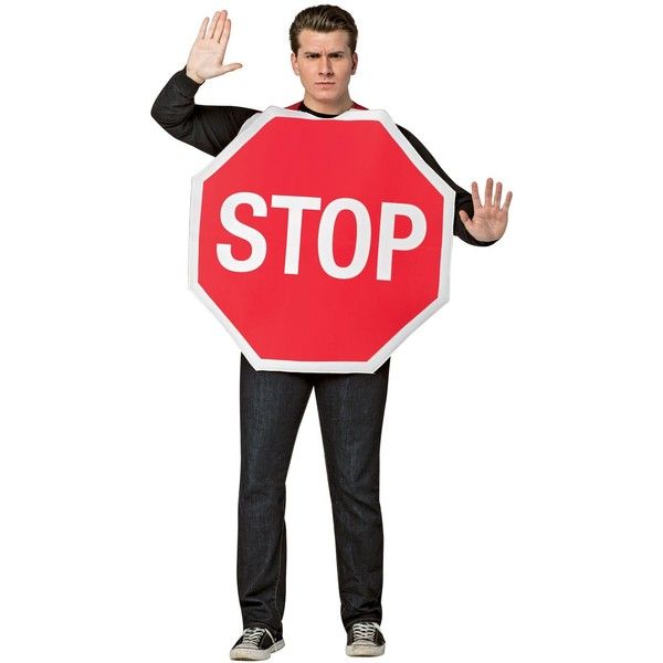 a man holding a stop sign with both hands