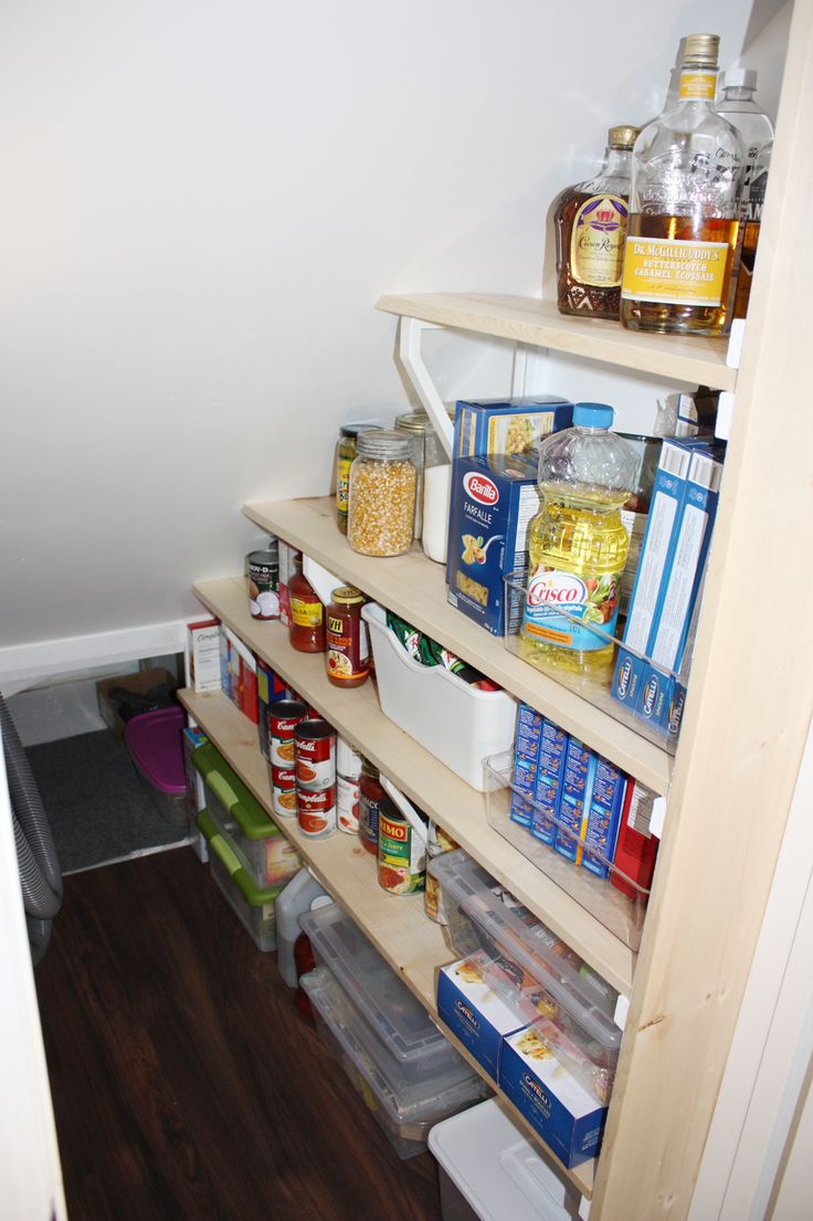 the pantry is stocked with all kinds of food