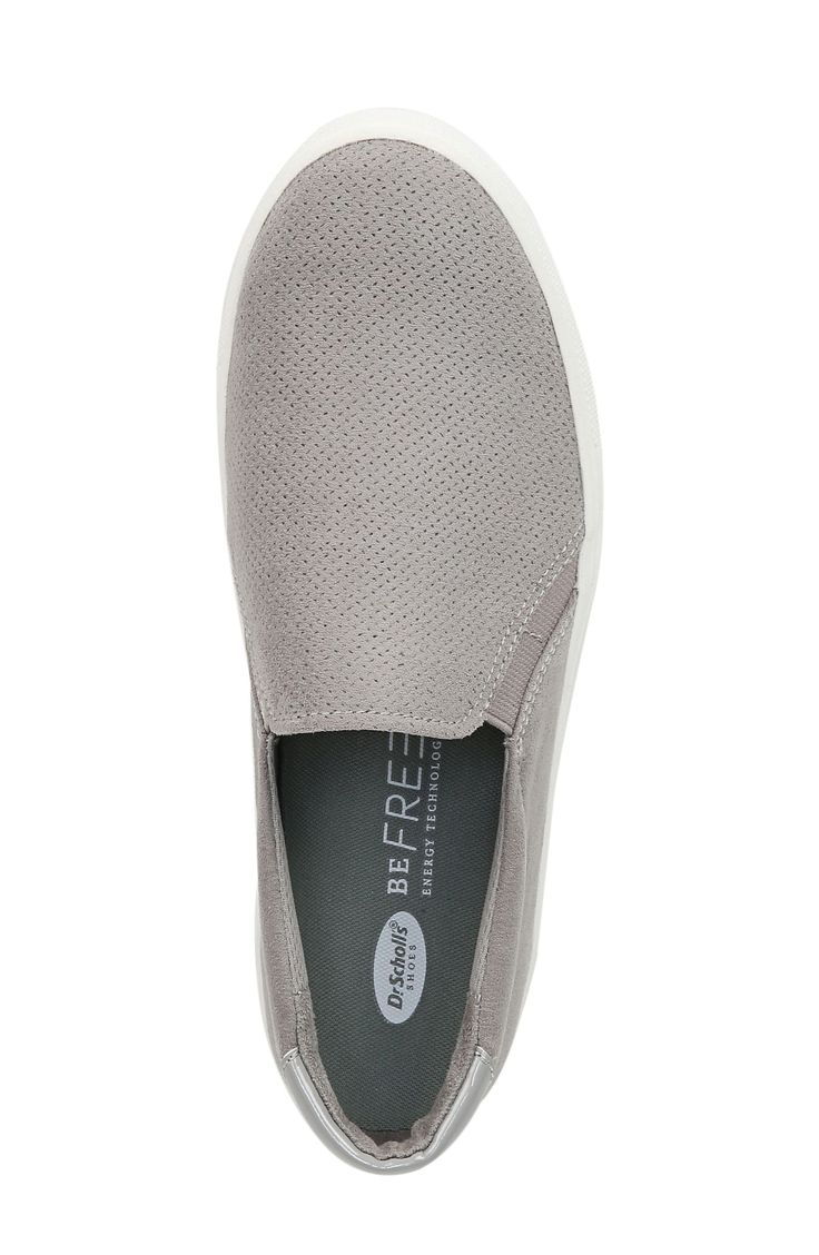 A thick bumper cupsole grounds this sporty-chic slip-on sneaker designed with an anatomically designed footbed that provides lasting comfort and support. The soft fabric lining is sustainably made from recycled plastic bottles. 1 3/4" platform     Removable, anatomically cushioned insole     Lining made from recycled plastic bottles     Synthetic or recycled textile upper/textile lining/rubber sole     Imported     This product meets Nordstrom Sustainably Sourced Materials criteria: contains at Sporty Chic, Recycle Plastic Bottles, Designer Sneakers, Grey Fabric, Recycled Plastic, Plastic Bottles, Soft Fabric, Women's Shoes, Slip On Sneaker