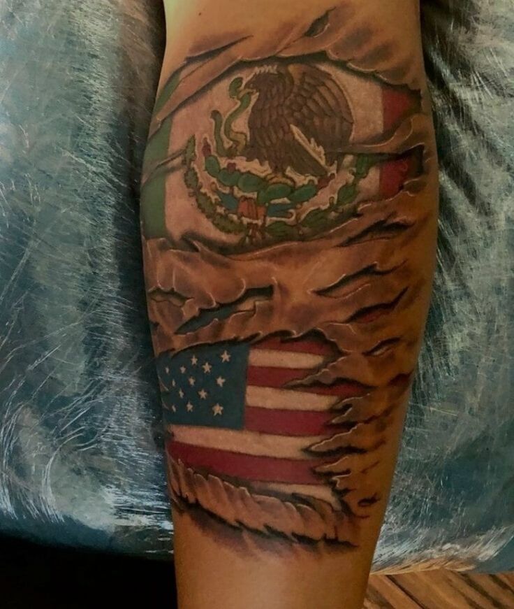 an american flag and eagle tattoo on the leg