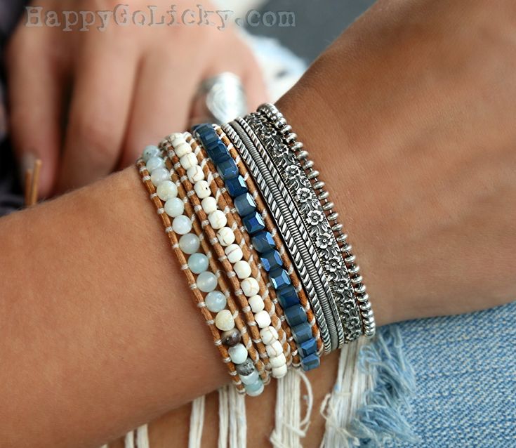 the bracelets are stacked on each other with bead wrap bracelets in different colors