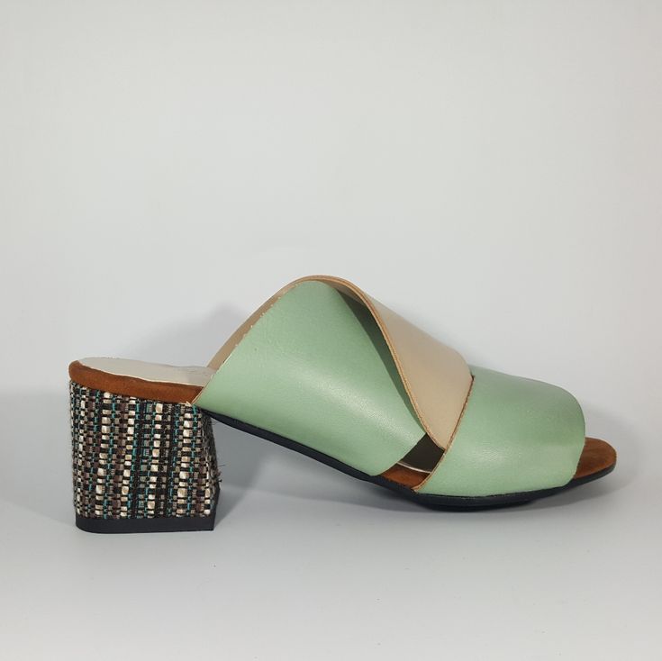 Never Worn Made In Italy Turquoise And Beige Faux Leather Interlocking Bands Padded Faux Leather Footbed 2 Inch Block Heel With Tapestry Detail Vegan - Animal Free European Size 37 Green Flat Heels With Leather Sole, Green Heels With Leather Sole And Flat Heel, Trendy Green Block Heel Mules, Spring Green Heels With Leather Sole, Green Sandals With Contrasting Heel Counter, Green Sandals With Contrasting Heel Counter For Spring, Spring Green Sandals With Contrasting Heel Counter, Green Flat Heel Evening Sandals, Green Flat Heel Sandals For Evening