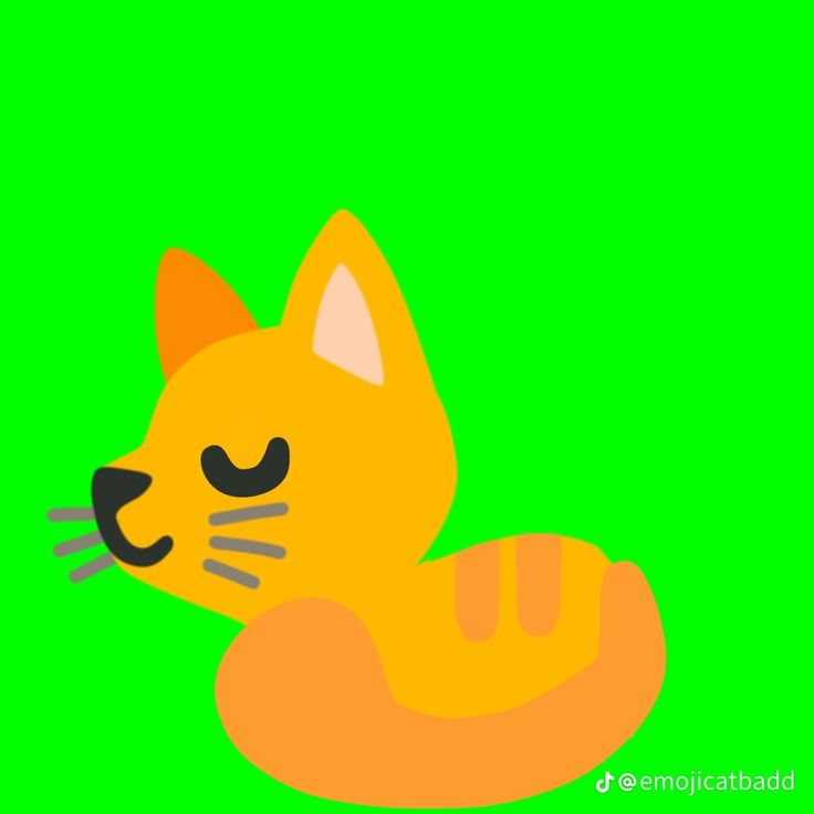 an orange cat sitting on top of a green background