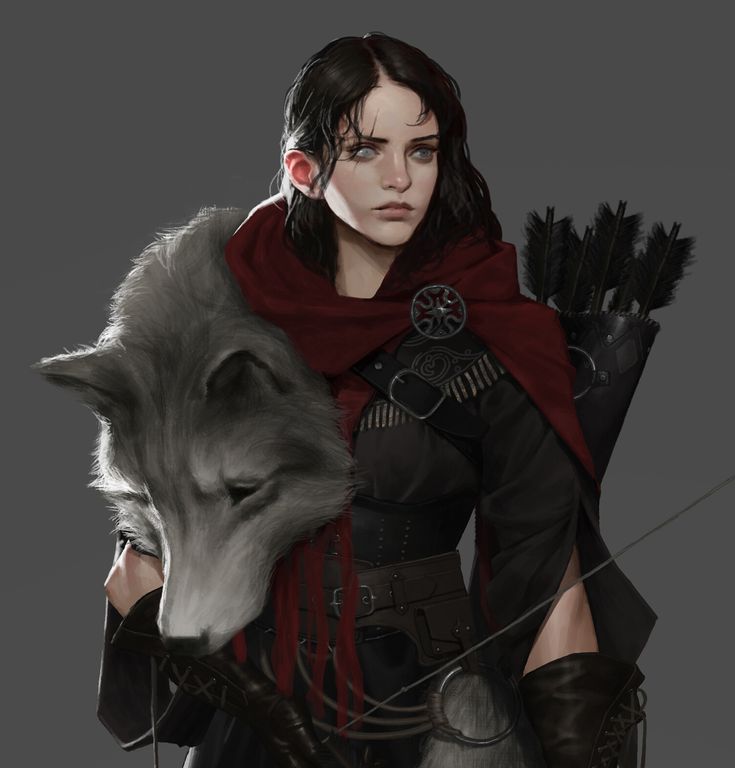 a woman holding a wolf in her hand and wearing a red scarf over her shoulder