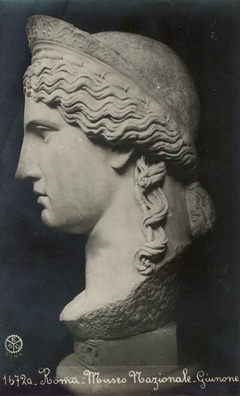 an old photo of a bust of a woman