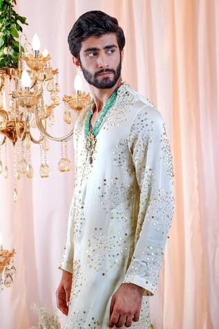 Shop for Mahima Mahajan Green Satin Organza Leon Sequin Embroidered Kurta Set for Men Online at Aza Fashions Anarkali Sherwani With Mirror Work For Reception, Anarkali-style Embellished Sherwani With Traditional Drape, Anarkali Sherwani With Mirror Work For Festivals, Anarkali Sherwani With Mirror Work For Party, Embroidered Chanderi Sherwani For Party, Anarkali Sherwani With Mirror Work For Diwali, Long Sleeve Embellished Kurta For Reception, Embellished Long Sleeve Kurta For Reception, Eid Reception Traditional Wear With Sequins