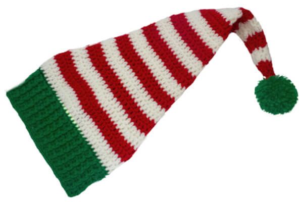 a knitted christmas hat with a pom - pom