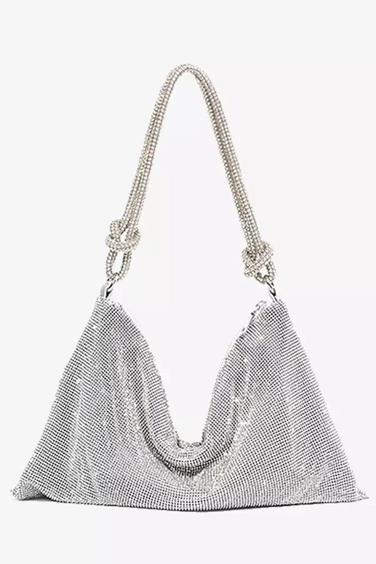 An accessory bag that can hold all your daily essentials - Octavia Silver Rhinestone Shoulder Bag. It's embellished with dazzling silver rhinestones and has knotted shoulder straps. Whether attending a banquet or going to work, this bag is your best choice!  Material: PU  One Size fits all Length/Height：34*16cm Weight：0.27kg  Colour may vary due to lighting on images Rhinestone Handbags, Silver Bag, Rhinestone Material, Wedding Purse, Travel Purse, Rhinestone Dress, Evening Handbag, Silver Rhinestone, Perfect Bag