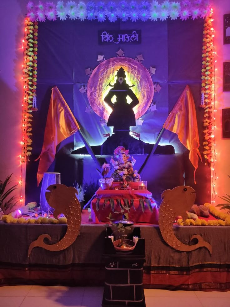 an idol is displayed in front of a stage with lights and decorations on the walls