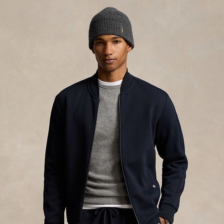 This flight-inspired jacket is crafted with a smooth double-knit fabric that offers water-repellent properties. Modern Track Jacket With Ribbed Cuffs, Modern Long Sleeve Track Jacket With Ribbed Cuffs, Fitted Track Jacket With Ribbed Cuffs For Fall, Classic Outerwear With Ribbed Cuffs For Layering, Classic Track Jacket With Ribbed Cuffs For Work, Classic Long Sleeve Sport Coat With Ribbed Cuffs, Winter Workwear Track Jacket With Ribbed Cuffs, Fitted Track Jacket With Ribbed Cuffs For Work, Sporty Fitted Outerwear With Ribbed Collar