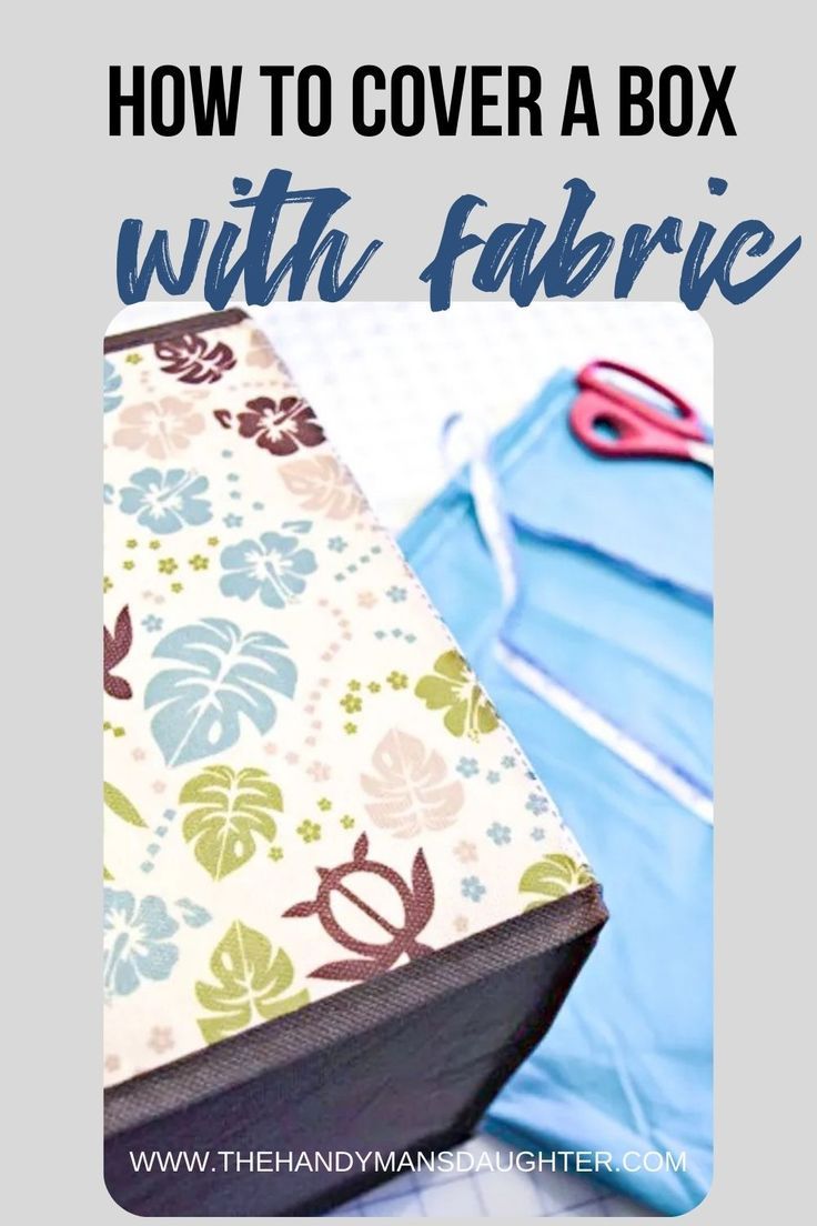 an open suitcase sitting on top of a bed with the words how to cover a box with fabric