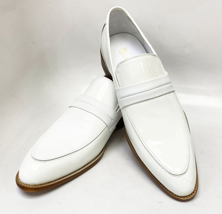 Patent Leather Slip-On Loafer White Elegant Combination of Patent & Matte Leather slip-on Penny Loafer from Carrucci features soft Calfskin lining and a clean welt! Pairs equally well with Jeans and Dress Attire! Modern White Slip-ons For Work, White Pointed Toe Slip-ons For Work, Elegant White Slip-ons For Office, White Leather Slip-ons For Office, White Almond Toe Slip-ons For Business, Elegant White Leather Slip-ons, Classic White Almond Toe Slip-ons, White Fitted Round Toe Loafers, White Fitted Loafers With Round Toe