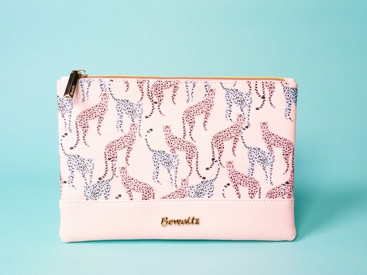 Our Pink Leopard Pouch will keep your stationery safe and sound but also looking pretty and pink too! It also works great for storing your makeup brushes! It makes perfect for a gift to a friend or to add to a gift basket! Dimensions: 9.5” x 6.625” Quality PU Leather Pink and blue leopard design Item #2095 Take a look at all of our other fun pouches here! Trendy Pink Pencil Case For Organization, Pink Rectangular Pouch With Pen Holders, Pink Portable Pencil Case, Rectangular Pink Pouch With Pen Holders, Trendy Pink Portable Pouch, Pink Cosmetic Bag With Pen Holders For Daily Use, Pink Pencil Case With Zipper Pouch For Organization, Pink Zipper Pouch Pencil Case For Organization, Trendy Portable Pink Pouch