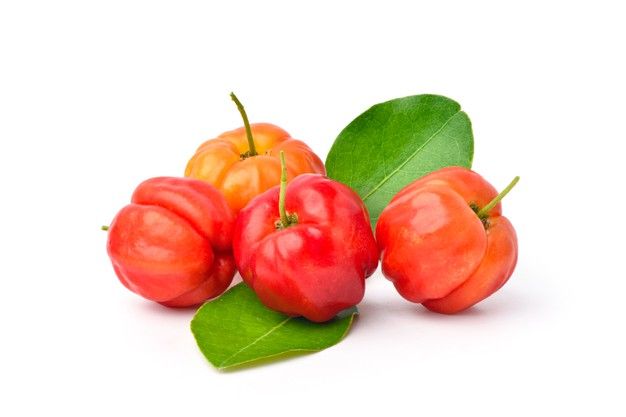 some red and yellow peppers with green leaves