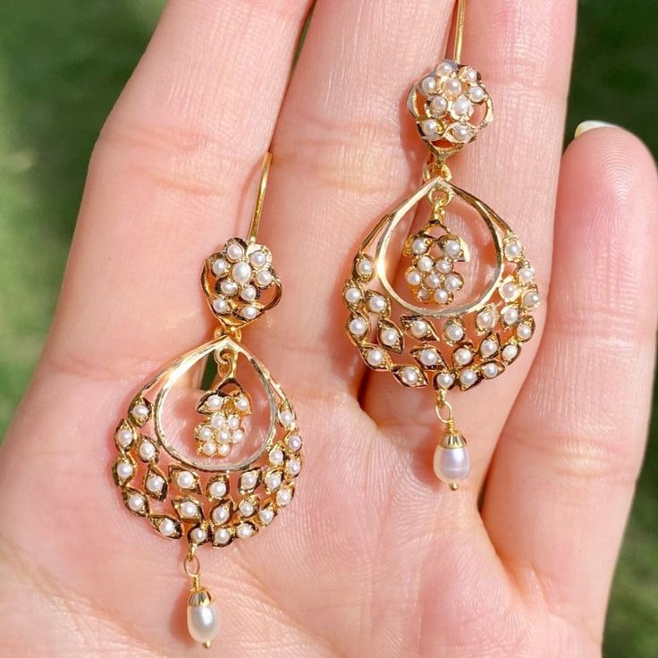 A pair of ultra lightweight, 22k gold chandbali earrings studded with pearls.  The earrings weigh 7.26 gms including 0.25 gms in the hanging pearl drops Luxury Traditional 22k Gold Pearl Earrings, Luxury Pearl Drop Chandbali Bridal Earrings, Cheap Gold Chandbali Jewelry, Luxury Chandbalis With Pearl Drop, Gold Chandbali Earrings, Gold Chandbali, 22k Gold Jewelry Necklaces, 22k Gold Earrings, 22k Gold Jewelry