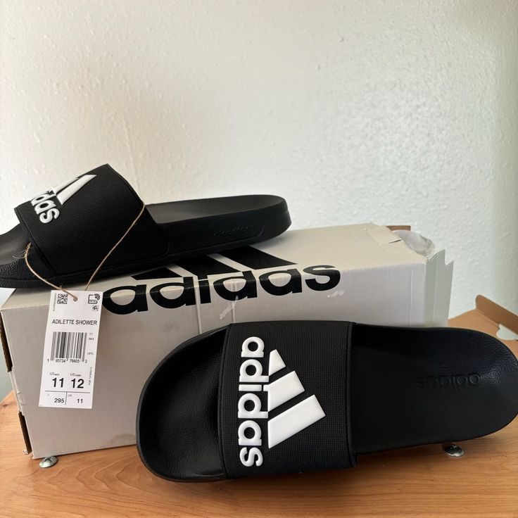 Men’s Adidas Shower Slides Sandals Black With White Logo Size 11 / 12 New With Tags In Box Thank You! Trying To Clear My Stuff Fast, So Offers Welcome! Black Adidas Logo Slides, Black Adidas Slides With Logo, Black Adidas Slides For Summer, Casual Adidas Slides With Logo, Adidas Black Slides With Logo, Casual Adidas Logo Slides For Streetwear, Adidas Casual Slides For Streetwear, Adidas Adilette, My Stuff