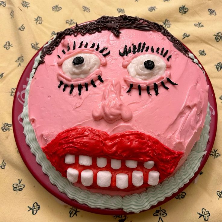 a cake decorated to look like a creepy face