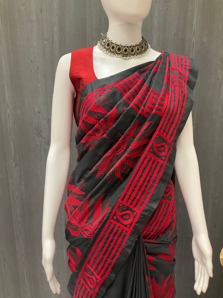 This elegant Indian Saree - black Kantha work saree features exquisite hand embroidery that adds a touch of sophistication to any wardrobe. The intricate stitching is a testament to the skill and craftsmanship of the artisans who created this stunning piece. The fall pico adds a finishing touch to this indian saree, ensuring it drapes beautifully and is easy to wear. Perfect for any formal occasion, this indian saree is sure to turn heads and make a statement. Don't miss out on the opportunity t Semi-stitched Black Art Silk Blouse Piece, Black Pre-draped Saree With Resham Embroidery, Festive Black Pre-draped Saree With Self Design, Black Bollywood Handloom Pre-draped Saree, Traditional Black Pre-draped Saree, Festive Black Embroidered Pre-draped Saree, Black Semi-stitched Embroidered Fabric, Unstitched Black Chanderi Embroidered Fabric, Black Chanderi Embroidered Saree Fabric