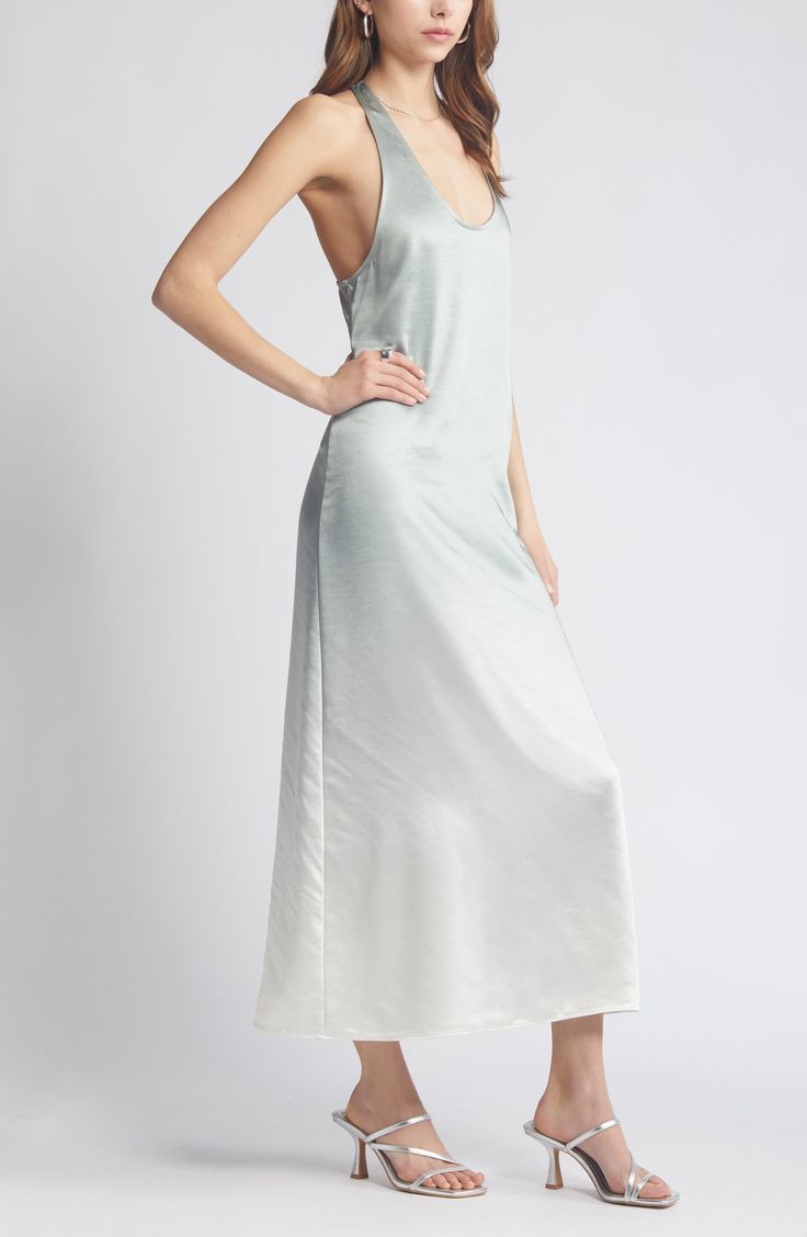 Move easily in this flowy maxi dress made of soft satin with a subtle sheen and designed with a racerback that won't get in your way. Slips on over head Scoop neck Racerback 100% polyester Machine wash, tumble dry Imported Spring Halter Neck Maxi Dress With Bias Cut, Spring Backless Satin Finish Maxi Dress, Backless Maxi Dress With Satin Finish For Spring, Spring Satin Finish Backless Maxi Dress, Backless Satin Finish Maxi Dress For Spring, Spring Backless Slip Dress With Satin Finish, Summer Satin Halter Neck Dress With Bias Cut, Spring Modal Satin Maxi Dress, Spring Silk Backless Maxi Dress