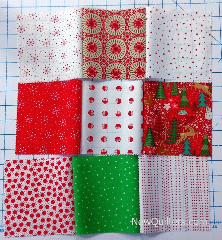 several different types of fabric on a cutting board