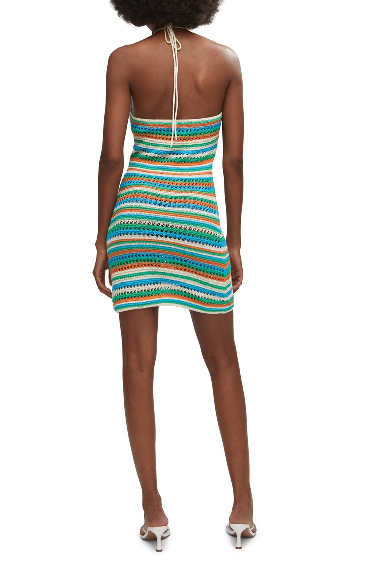 Enter your next cabana party in colorful style with this bright crochet minidress showcasing dainty open stitching. Ties at neck Halter neck Unlined 52% cotton, 48% polyester Hand wash, dry flat Made in Turkey Summer Crochet Trim Mini Dress, Spring Vacation Mini-length Crochet Dress, Spring Vacation Mini Crochet Dress, Blue Mini Crochet Dress For Vacation, Blue Crochet Mini Dress For Vacation, Blue Mini-length Crochet Dress For Vacation, Blue Mini Length Crochet Dress For Vacation, Summer Style Crochet Mini Dress, Blue Mini Dress For Summer Parties