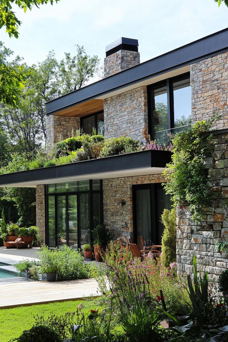 a house that has some plants on the roof