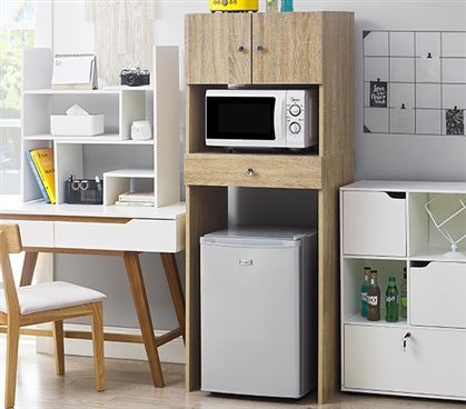 a microwave oven sitting on top of a wooden shelf