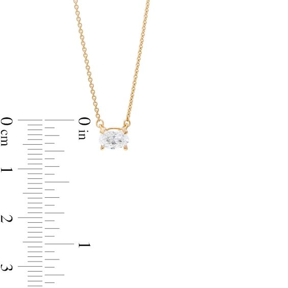 Lovely alone or layered, this oval lab-created diamond solitaire necklace in 14K gold gives you the style options you desire. Crafted in 14K gold A sideways 1/3 ct. certified oval-shaped lab-created diamond solitaire suspends centered along a cable chain. F color/SI2 clarity lab-created diamond Includes certification card This 18.0-inch necklace adjusts to 16.0 and 17.0 inches and secures with a lobster claw clasp. Classic 14k Gold Oval Solitaire Necklace, Timeless 14k Gold Oval Diamond Necklace, Elegant Gold Oval Solitaire Necklace, Elegant Oval Gold Solitaire Necklace, Classic Gold Oval Diamond Necklace, Gold Oval Solitaire Necklace With Diamond Cut, Oval 14k Gold Solitaire Necklace For Formal Occasions, Yellow Gold Solitaire Necklace With Oval Pendant, Formal 14k Gold Oval Solitaire Necklace