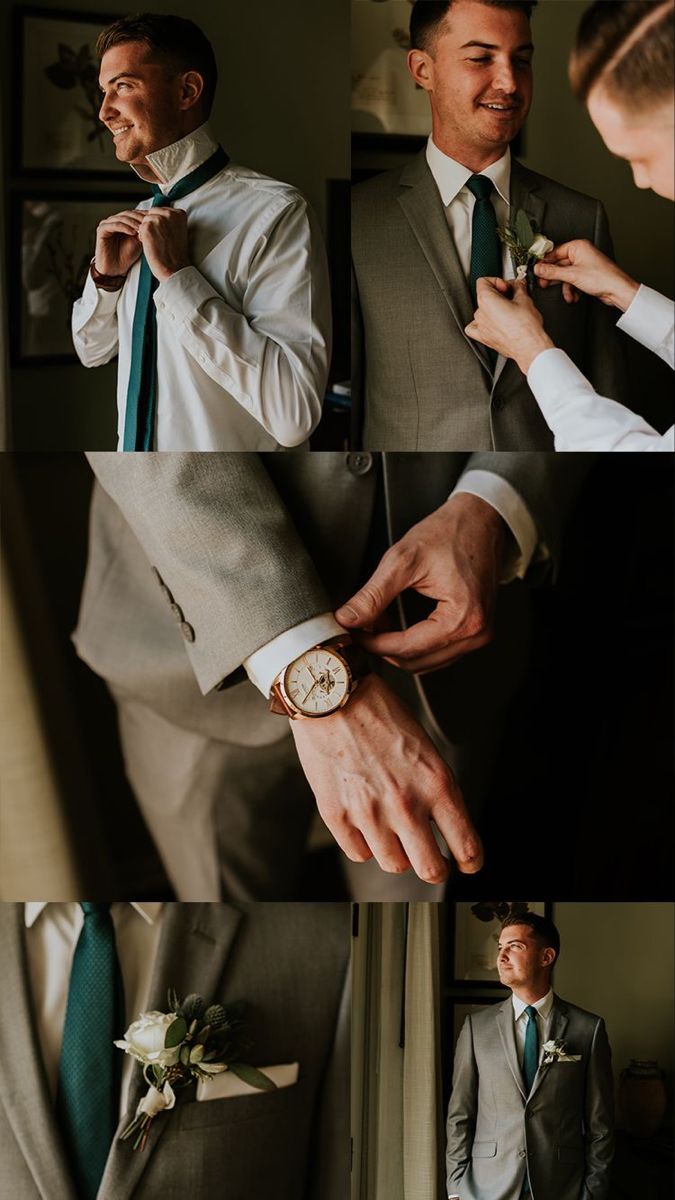 a man in a suit adjusting his tie while another man looks on from the other side