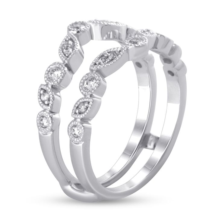 two white gold wedding bands with diamonds