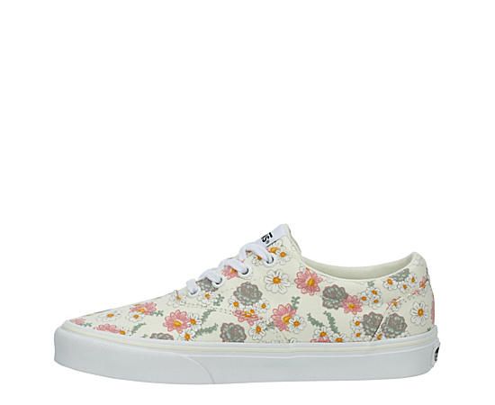 Vans Doheny Womens Sneaker Stay cool and casual in the Doheny womens Sneaker , inspired by the Vans Authentic. Featuring a breathable canvas upper , this lace-up Shoe has a cool floral design. A vulcanized midsole & signature waffle outsole cushion each step, offering elevated traction as well as style. Canvas/suede upper Lace-up closure Floral printVulcanized midsoleWaffle Rubber outsole Casual Lace-up Sneakers With Floral Print, Casual Floral Print Lace-up Sneakers, Vans Textile Sneakers For Spring, Vans Sneakers With Laces For Spring, Vans Sneakers For Spring, Spring Cream Cotton Sneakers, Vans Floral Print Sneakers For Summer, Vans Floral Print Summer Sneakers, Vans Cream Sneakers For Summer