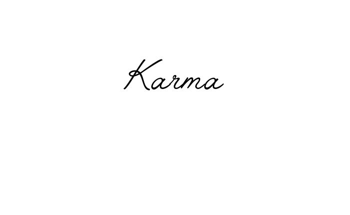 the word karma written in cursive writing on a white background with black ink