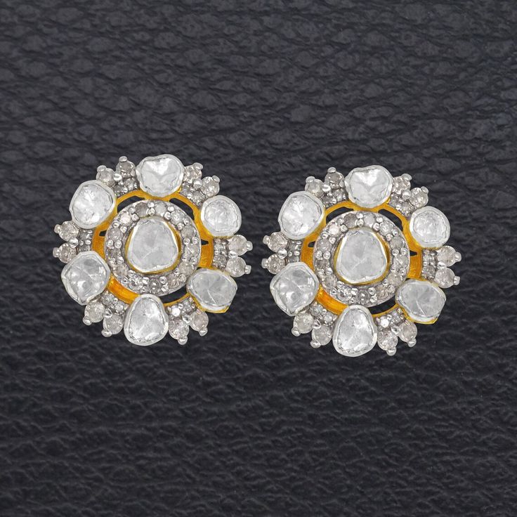 Description.... 14K Gold Plated Earring, Uncut Polki Diamond & Single Cut Diamond Stud Earring, 925 Silver, Diamond Stud, Party Wear Earring, Anniversary Brand: JAYSEE JEWELLERS Country/Region of Manufacture: India Metal ; Sterling Silver Metal Purity ; 925 parts per 1000 Length : 17 mm Width : 17 mm Gemstone : Polki Diamond  Main Stone : Polki Diamond  Secondary Stone : Pave Diamond  Stone Color: As Per Seen In Picture Stone Shape: As Per Seen In Picture Silver Diamond Cut Earrings With American Diamond, Silver Diamond Cut Earrings With Cubic Zirconia, Silver American Diamond Earrings With Diamond Cut, White Diamond Gemstone Earrings For Anniversary, Silver Diamond Earrings With Accents For Celebration, Silver Cluster Earrings With Single Cut Diamonds, Silver American Diamond Cut Earrings, Anniversary White Diamond Gemstone Earrings, Traditional Earrings With Diamond Accents For Celebration