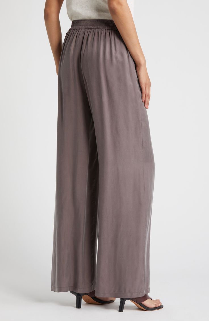 Refresh your wardrobe with streamlined, full-length wide-leg pants made with an elastic waist for comfort wherever the day takes you. Elastic waist 58% cupro, 42% viscose Machine wash, line dry Imported Casual Full-length Viscose Bottoms, Full Length Rayon Pants With Elastic Waistband, Casual Viscose Wide Leg Full Length Pants, Casual Full Length Wide Leg Viscose Pants, Silk Wide Leg Bottoms With Elastic Waistband, Casual Wide Leg Modal Bottoms, Casual Modal Wide Leg Bottoms, Wide Leg Silk Pants With Elastic Waistband, Full Length Rayon Pants For Loungewear