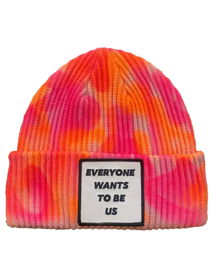 Customized rib knit beanie by Asta Razma. Hand painted all over in shades of orange and pink. Patch at front reads: "Everyone Wants to be Us" One Size Pink Casual Beanie Cap, Casual Pink Beanie One Size, Casual Pink Beanie, Casual Pink One-size Beanie, Trendy Beanie For Spring Streetwear, Trendy Pink Cotton Beanie, Trendy Spring Beanie For Streetwear, Trendy Streetwear Beanie For Spring, Casual Pink Beanie For Spring