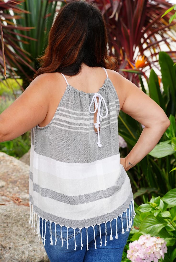 Sail through your day in style with our Skipper Top in Peppercorn! 🌿⚓️ Fit: Enjoy a relaxed, breezy fit that’s perfect for any summer adventure. Features: Made from luxurious Turkish cotton, this top is lightweight, breathable, and accented with chic fringe details. Why We Love It: The Peppercorn color adds a sophisticated touch to your summer wardrobe, effortlessly blending comfort and elegance! 🖤👚 Color: Peppercorn Cotton Tops With Frayed Hem For Summer, Breezy Relaxed Fit Vacation Tops, Breezy Relaxed Fit Top For Vacation, Breezy Cotton Top For Vacation, Beach Season Tops For Summer Outings, Beachwear Tops For Summer Beach Season, Beachwear Tops For Summer Beach Outings, Beachwear Tops For Summer Outings, Relaxed Summer Tops With Frayed Hem