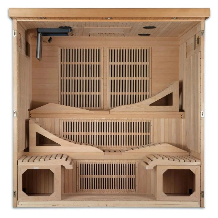 the inside of a wooden sauna with four separate sections and two doors on each side