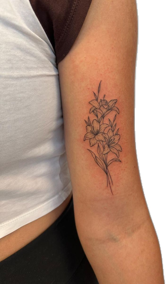 Small Flower Tattoo Cover Up, Name Bouquet Tattoo, Flower Tattoo Behind Arm Above Elbow, Tennessee Flower Tattoo, Realistic Bouquet Tattoo, Water Lily July Tattoo, Flower Tattoos Women Arm, Flower Tattoo Over Scar, Lily Flower Arm Tattoo