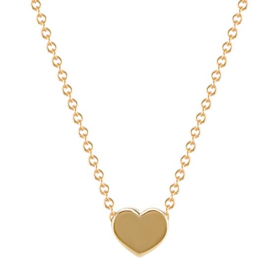 This dainty and elegant heart pendant is crafted from quality 14 karat yellow gold and is a lovely addition to any attire. The pendant measures 1/4 of an inch, hangs from a matching cable chain and is secured by a lobster clasp. Gold Heart Pendant, Gold Heart Earring, 14k Yellow Gold Necklace, Heart Pendant Gold, Platinum Jewelry, Disc Pendant, Yellow Gold Chain, Hand Crafted Gifts, Sapphire Jewelry