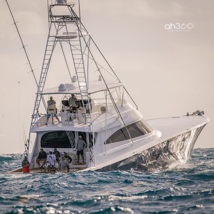 people on a boat in the middle of the ocean