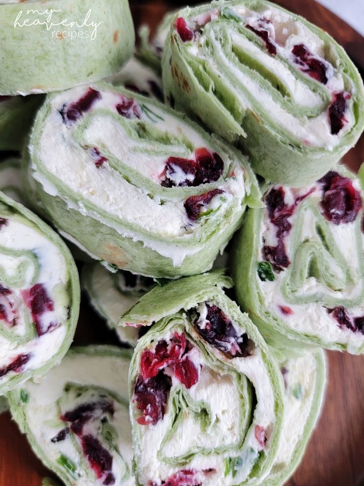 there are many rolls with cranberry fillings on the top one is rolled up